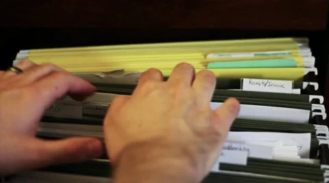 Remove Paper from Filing Cabinet Stock Footage 10898194