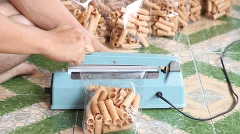 Remove the pastry from the sealed plastic bag. Stock Footage 62806681