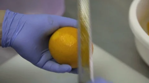 Remove a peel from orange Stockbeeldmateriaal 73809043