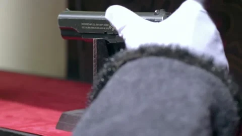 To remove a pistol Stock Footage 235267881