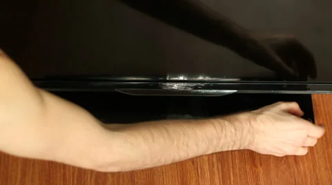 Remove Protective Tape From TV 2 Stock Footage 35554229