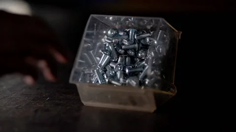 Remove screws from a container Stock Footage 203855806