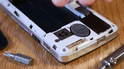 Remove screws with a screwdriver Stock Footage 72435253