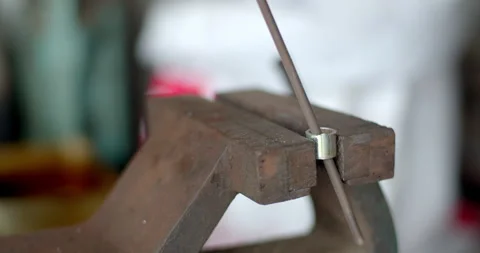 Remove sharp edges from cuts with a file.Files suitable for deburring steel. Stock Footage 310748666