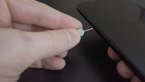 Remove SIM Card or Nano SIM Stock Footage 127593631