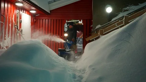 Remove snow fast with powerful blower equipment designed for tough jobs Stock Footage 300654237