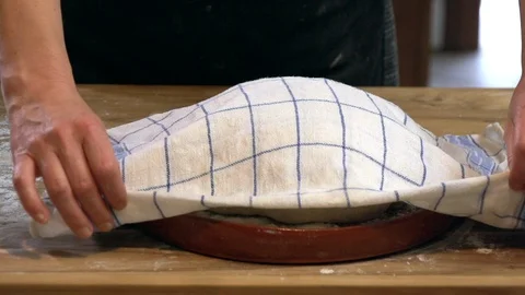 Remove the tablecloth from the dough Stock Footage 90395308