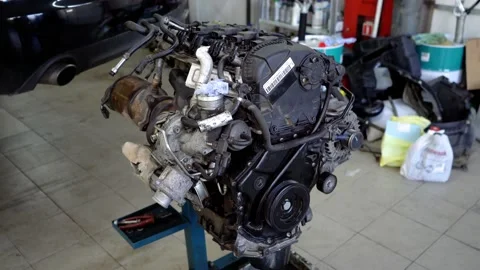 The removed engine from the car Stock Footage 144910474