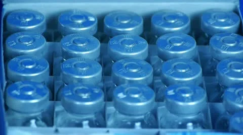 Removed injection bottle from box. Stock Footage 10852732