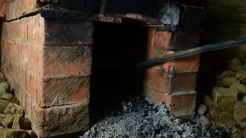 Removes ash from the stove Stock-Footage 116884743