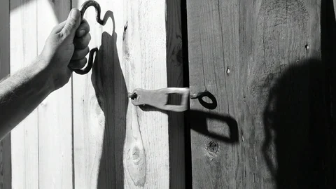 Removes the lock opens the door Stock Footage 110842516