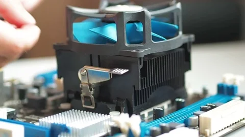 Removing And replacing Fan CPU on the mo... | Stock Video | Pond5