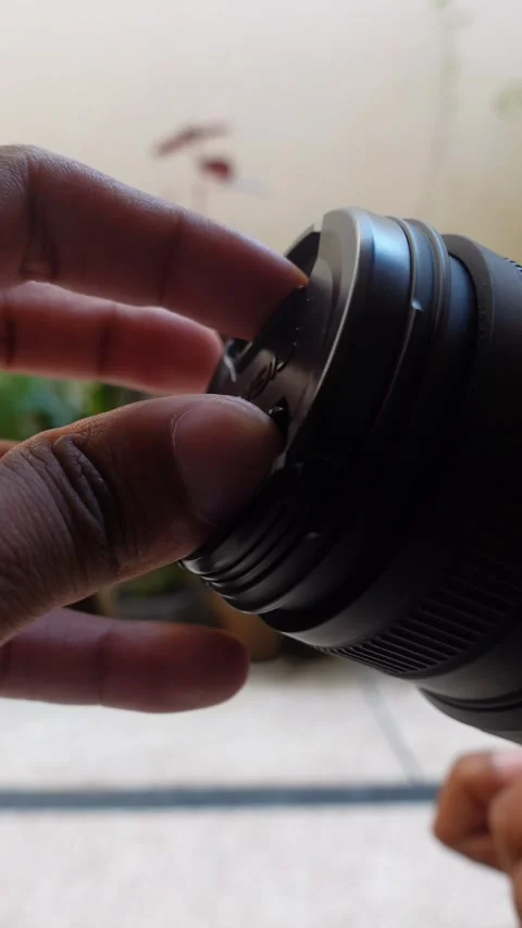 Removing Camera Lens Cap &amp; Turning On Camera, Sibi, Pakistan 1 Sep 2026 Stock Footage 345872654