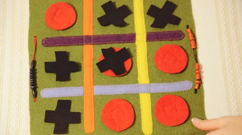 Removing cross and circles from green cloth closeup 4K Vidéo 63778865