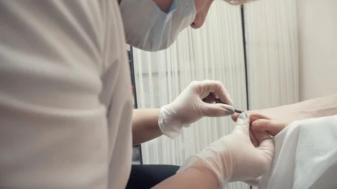 Removing cuticles with nipper Stock Footage 87825265