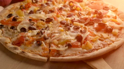 Removing a delicious slice of vegetarian pizza Stock Footage 62479498