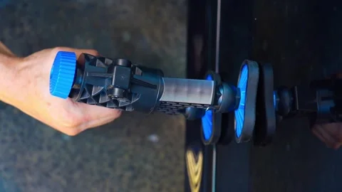 Removing dents on the car. PDR technology. Car body repair without painting. Stock Footage 345242188