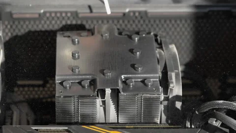 Removing Dust From Computer cooler With Air Blowing slow motion  Stock Footage 156766322