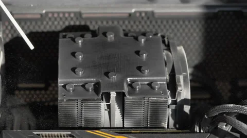 Removing Dust From Computer cooler With Air Blowing slow motion Stock Footage 156766414