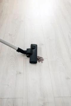 Removing dust from floor Stock Photos