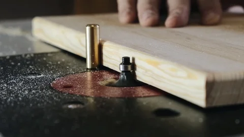 Removing an edge from a tree using a milling machine. Close-up. Slow motion. Stock Footage 113993778