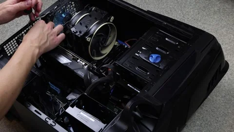 Removing a graphics card from PC computer case. Stock Footage 321280895