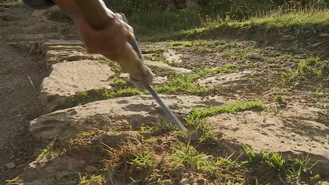 Removing Grass From Stone Paths, Andes, Peru Stock Footage 109215109