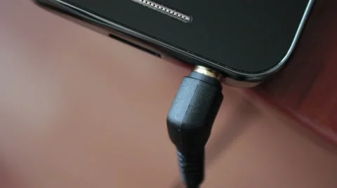 Removing headphone jack from the smartphone. Stock Footage 55715148