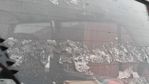 Removing ice from the Windows of an old car Video stock 120551711