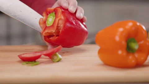 Removing Inside of Red Bell Pepper with a Knife Stock Footage 155114899