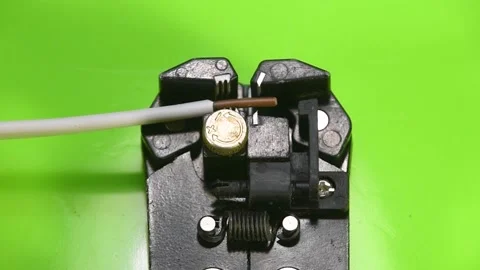 Removing insulation from copper wires. (chroma key) Stock Footage 164995978