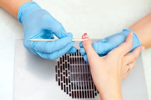 Removing manicure Stock Photos