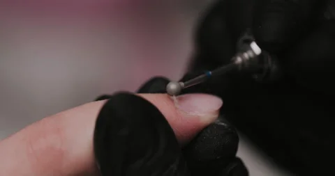 Removing the nail plate with a milling machine. Manicure process in beauty salon Video stock 149366729