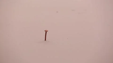 Removing a nail without the sponge 2 Stock Footage 132218904