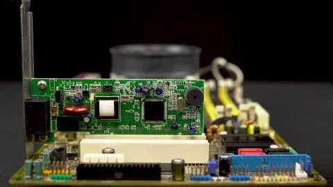 Removing a network card from the motherboard. Network data transmission system Stockfoto's