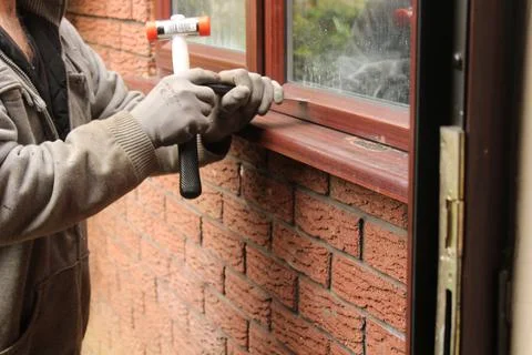 Removing an old window Stock Photos