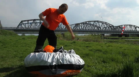 Removing the paraglider. Preparations flyer. Stock Footage 62593795