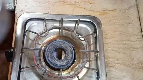 Removing Pot of Boiled Potato Chunks from Stove and Turning Off Heat, Kitchen Video stock 329094895