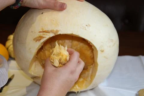 Removing the pulp and seeds Stock Photos