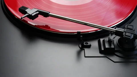 Removing red vinyl record from a turntable - close up of tonearm Stock Footage 149075076