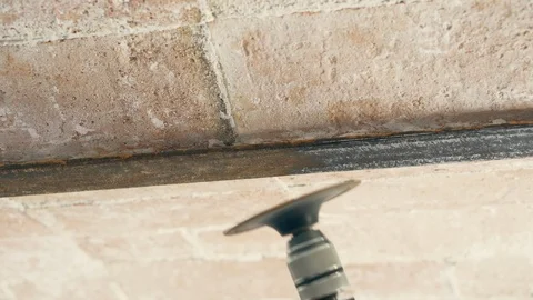 Removing Rust from Ceiling Iron Beam Stock Footage 118843976