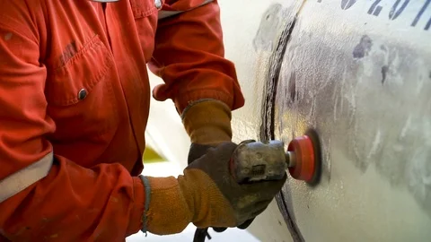 Removing rust on pipeline surface. Stock Footage 103924346