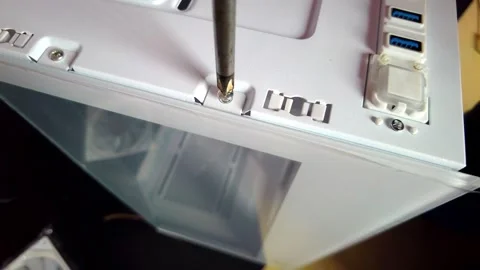 Removing screw from the desktop chassis box Stock Footage 333495955