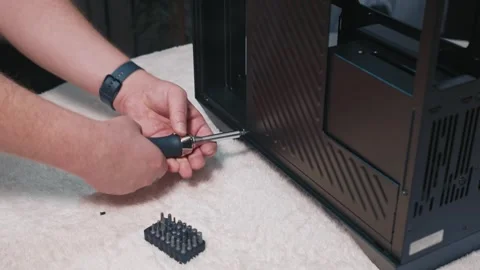 Removing side panel of computer case to access internal compartments Stock Footage 324592294