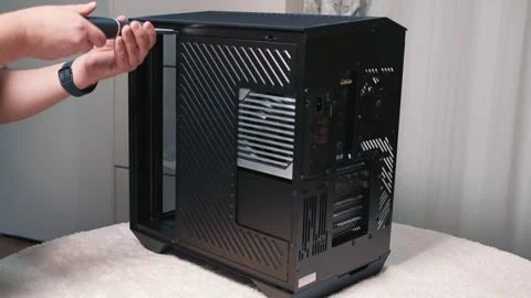 Removing side panel from computer case during assembly Stock Footage 340882681