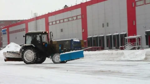 Removing snow with plow, close up of iron snowplow pushing a lot of snow away Stock Footage 57759919