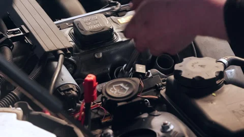 Removing a spark plug from a car engine. Close up. Stock-Footage 337879310