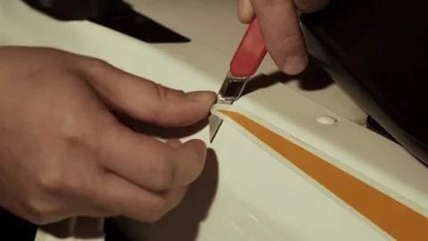 Removing stickers from the car surface Stock Footage 127205899