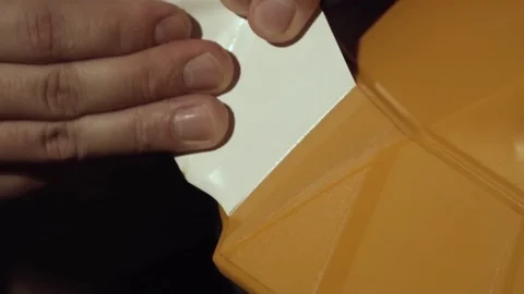 Removing stickers from the car surface Stock Footage 127205975