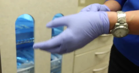 Removing Surgical Gloves Stock Footage 62767324